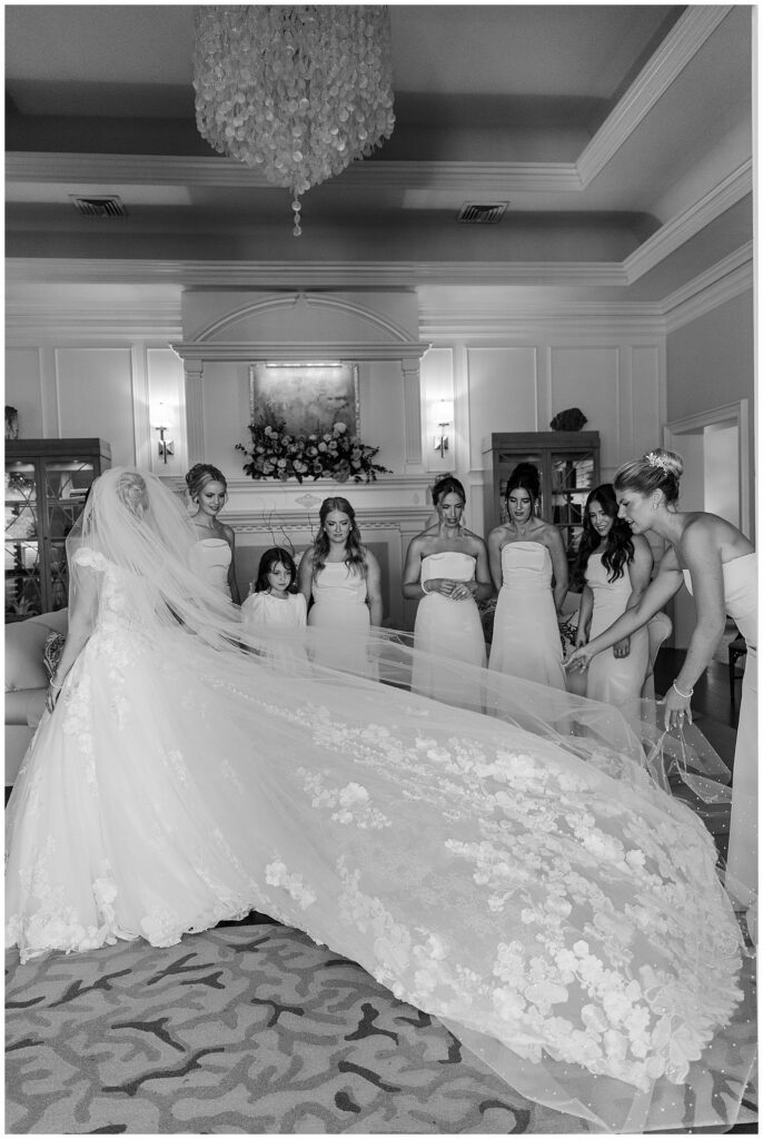 Bride and her bridesmaids getting ready