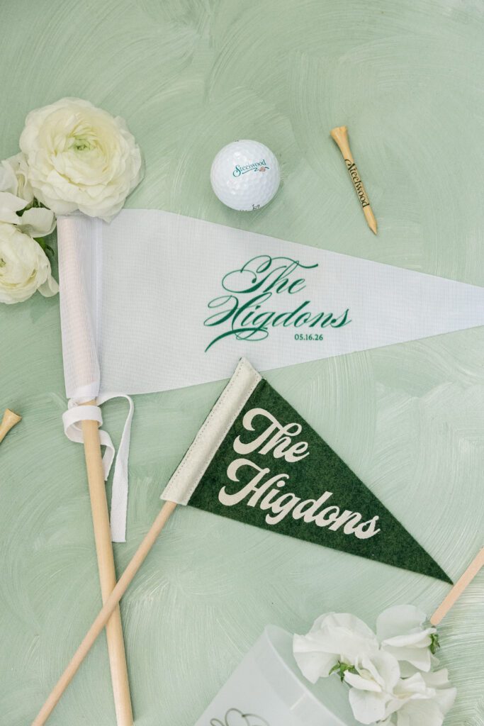 Personalized green wedding pennants and golf details for a Steelwood Country Club wedding